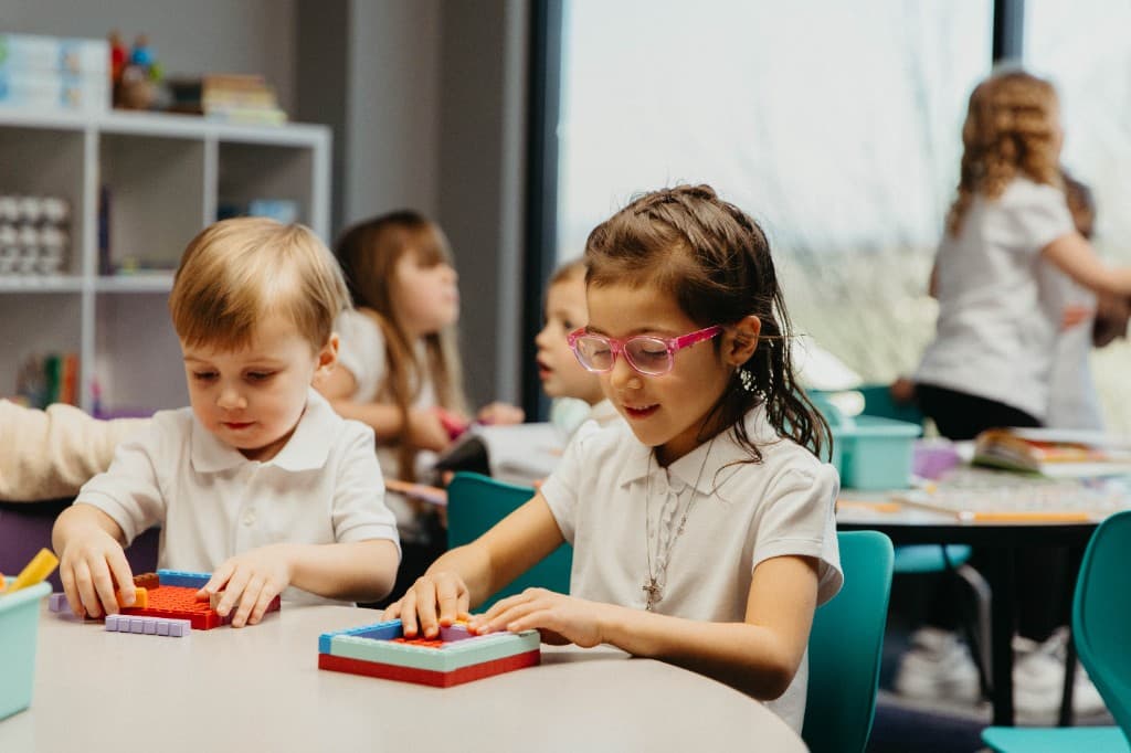 Students building with blocks in the classroom